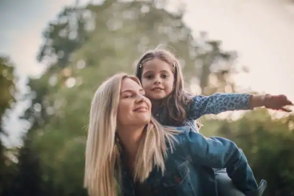 happy mum and daughter following mediation to resolve parental alienation Workington